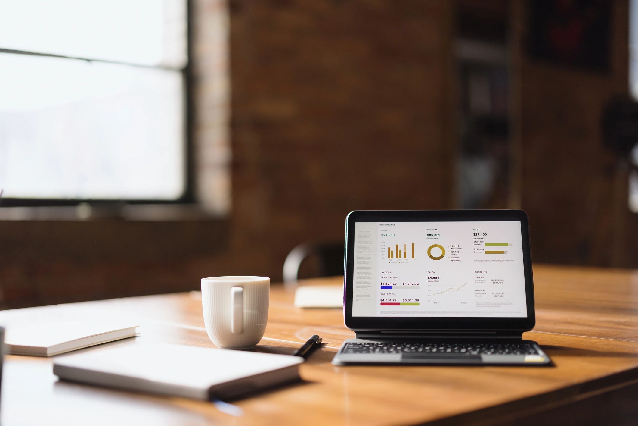 Laptop displaying ecommerce performance charts and graphs